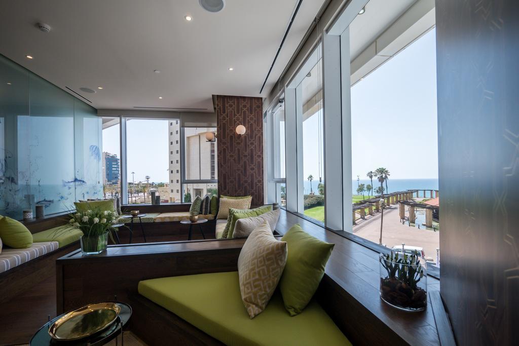 David Tower Hotel Netanya By Prima Hotels - 16 Years Plus Exteriör bild The interior of a suite at the InterContinental